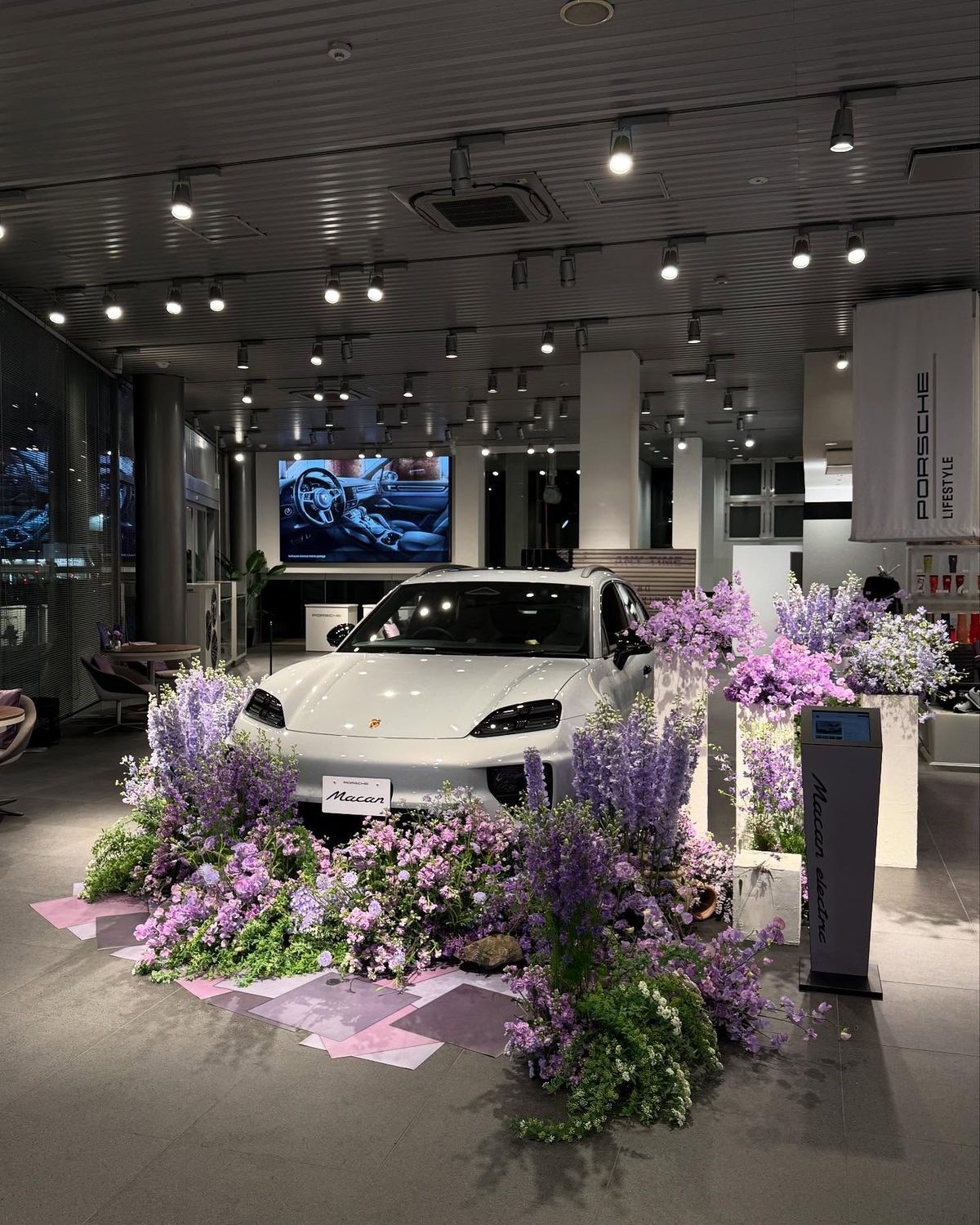 Beautiful wedding car decorated with fresh flowers and ribbons
